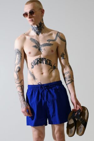 Pantaloni sucrti de baie cu snururi si model uni