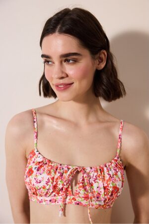 Sutien de baie cu model floral si decupaj
