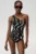Undress Code costum de baie dintr-o bucată About You Swimsuit culoarea negru, cupa moale, 940